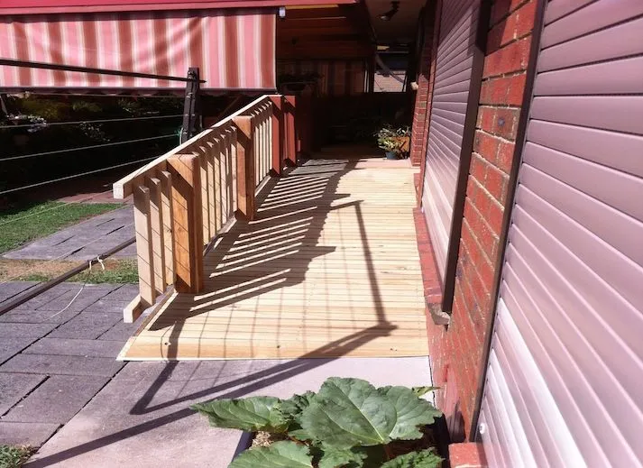 Timber access ramp with handrail