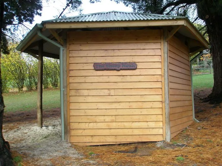Shelter with bull-nose roof